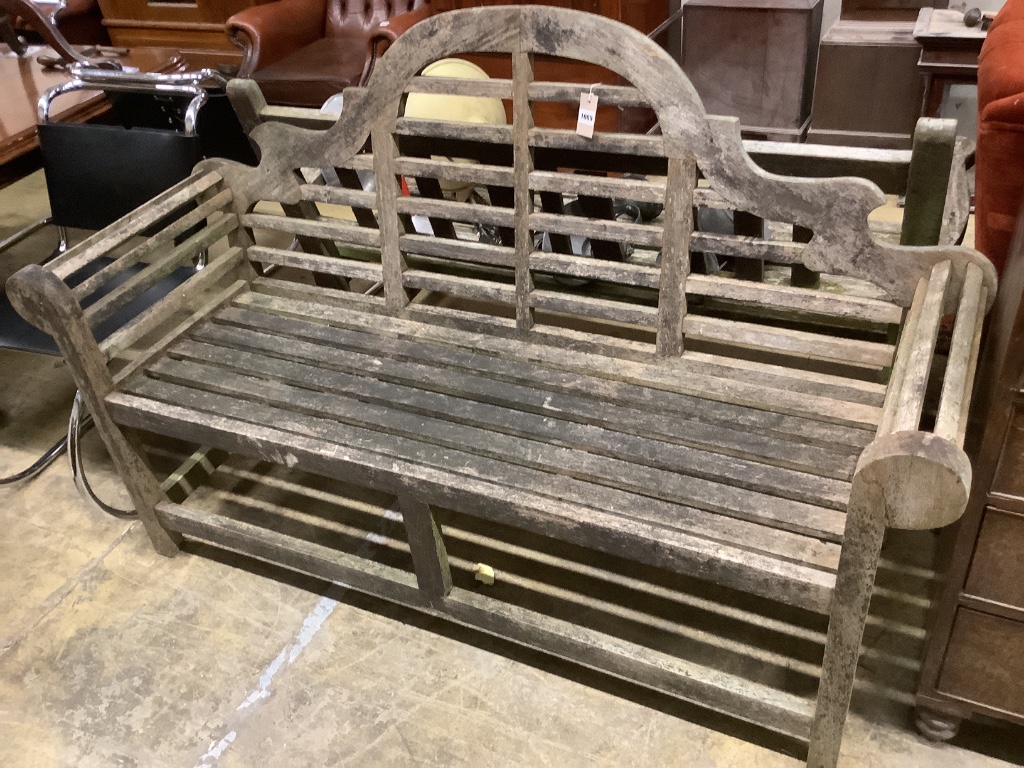 A Lutyens style weathered teak garden bench, length 166cm, depth 54cm, height 110cm